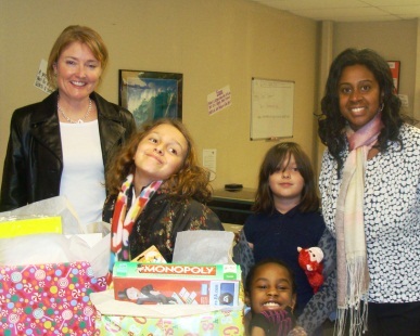 AT&T delivers art supplies they collected for the girls