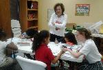 Volunteers tutor 3rd grade girls for their STAAR tests